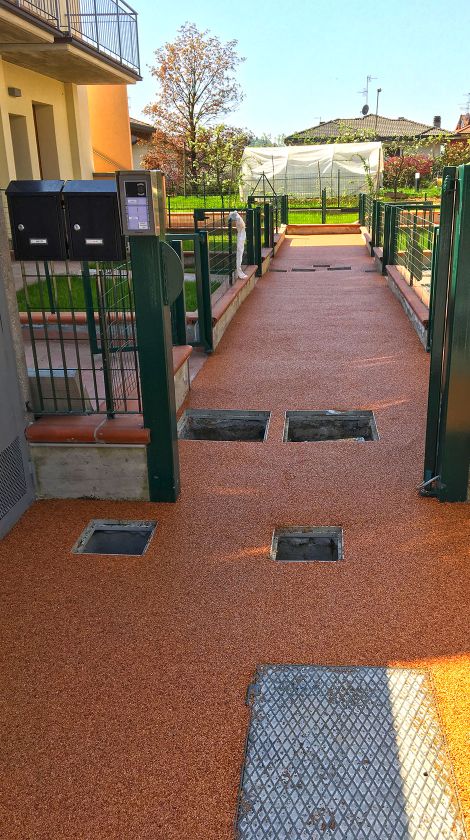 Pavimentazioni in resina per esterni rampe vialetti condominio